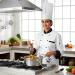 Load image into Gallery viewer, Female chef in white uniform cooking vegetable curry in stainless steel pot in modern kitchen
