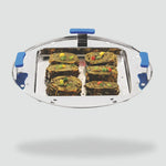 Load image into Gallery viewer, Stainless steel round serving tray with blue handles holding six vegetable rolls garnished with herbs