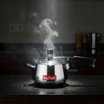Load image into Gallery viewer, Max Fresh stainless steel pressure cooker with steam rising on kitchen countertop