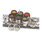 Load image into Gallery viewer, Stainless steel spice jars with lids and spoons on a black and white checkered mat