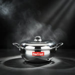 Load image into Gallery viewer, Steaming polished stainless steel Max Fresh cooking pot with lid and black handles on dark surface