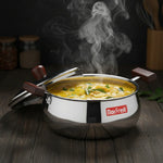 Load image into Gallery viewer, Steaming hot curry in stainless steel MaxFresh pot with wooden handles on dark wooden surface