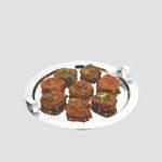 Load image into Gallery viewer, Stainless steel steaming tray with seven seasoned fried eggplant pieces garnished with herbs