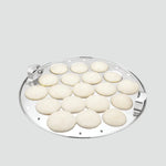 Load image into Gallery viewer, Stainless steel idli plate with 20 idlis, round molds, and two side handles on light background