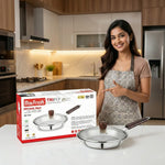 Load image into Gallery viewer, Woman in apron pointing at Max Fresh Triply cookware frying pan with glass lid in modern kitchen