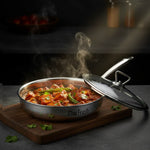 Load image into Gallery viewer, Steaming spicy paneer curry with green chilies and coriander in Max Fresh stainless steel pan on wooden board