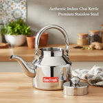 Load image into Gallery viewer, Shiny stainless steel Indian chai kettle with lid on wooden kitchen countertop