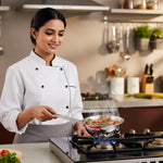 Load image into Gallery viewer, Female chef cooking spicy dish with chili and herbs in MaxFresh stainless steel pan on gas stove