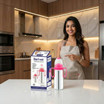 Load image into Gallery viewer, Smiling woman in beige apron pointing at Max Fresh stainless steel feeding bottle in modern kitchen