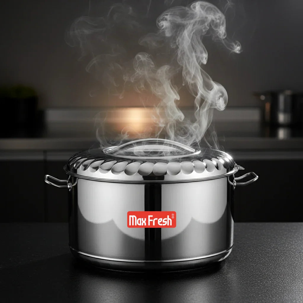 Stainless steel casserole with handles and steam, on kitchen counter