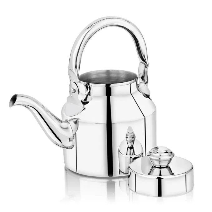 Shiny stainless steel Indian tea kettle with a curved spout and separate lid on white background