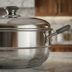 Load image into Gallery viewer, Stainless steel pot with lid and black handle on marble kitchen countertop