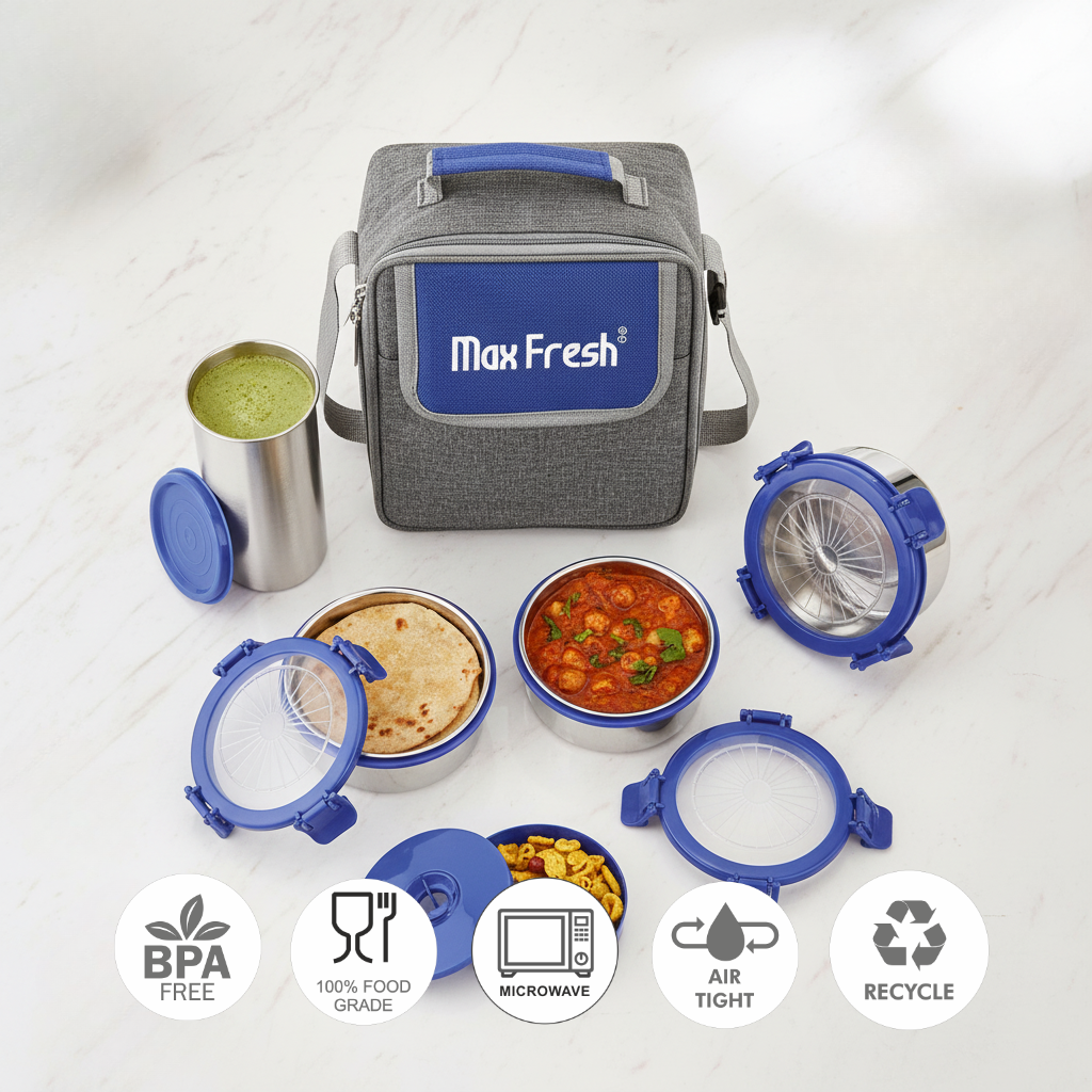 Stainless steel lunch box set with airtight blue lids, insulated bag, and food containers.
