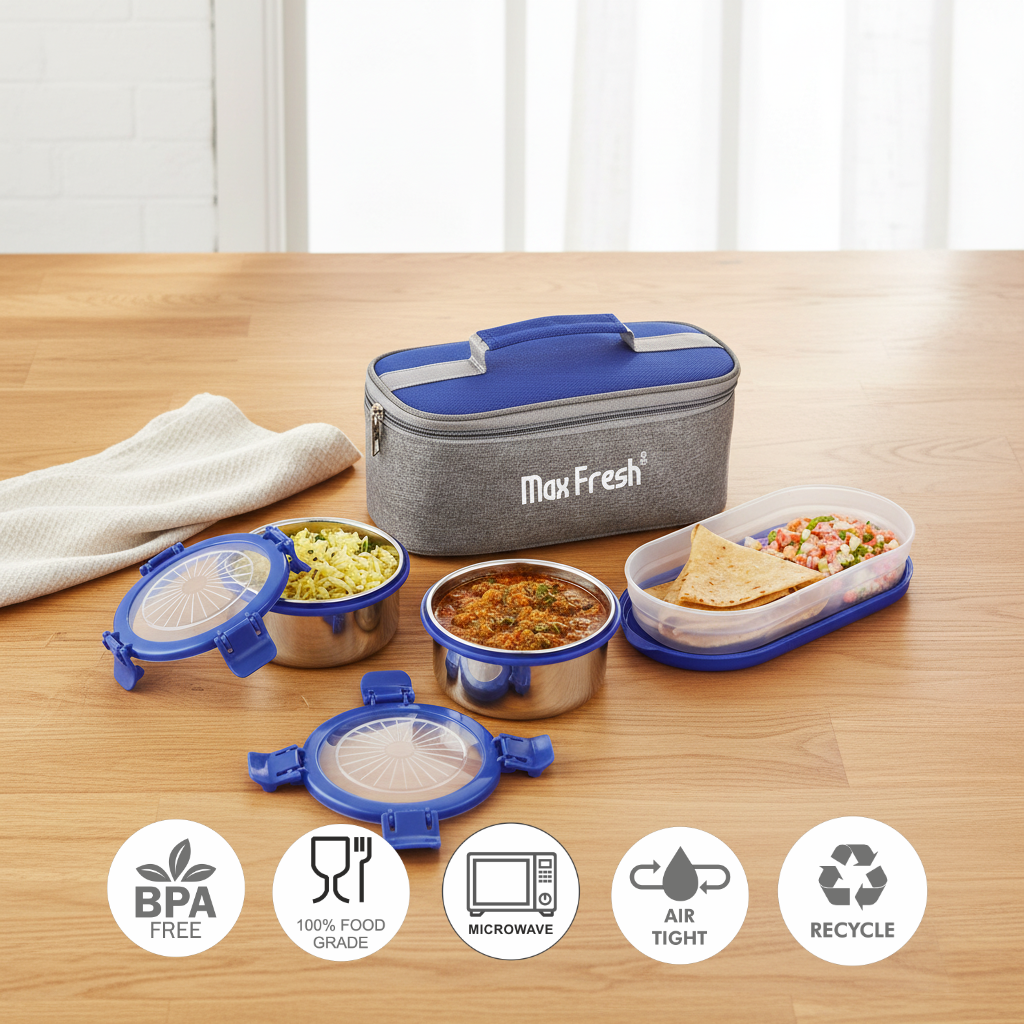 Stainless steel lunch box set with blue lids, insulated lunch bag, food containers and BPA free, microwave safe, airtight features icons on wooden table.