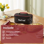 Stainless steel lunch containers, roti dabba, and insulated pouch on a kitchen table.