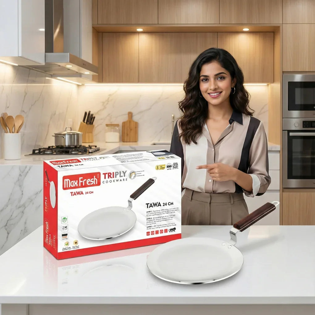 Smiling woman in modern kitchen presenting Max Fresh Triply cookware tawa with wooden handle and packaging