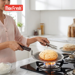 Person cooking flatbreads on a gas stove with 'Max Fresh' branding.
