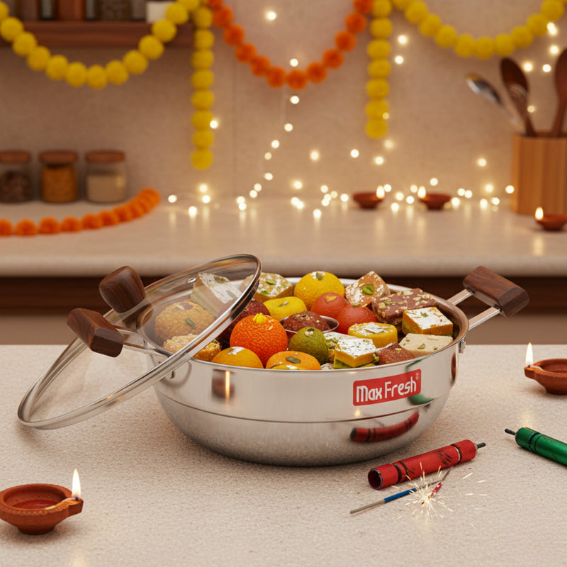 Decorative pot filled with sweets on a festive table with lights and Diwali decorations.