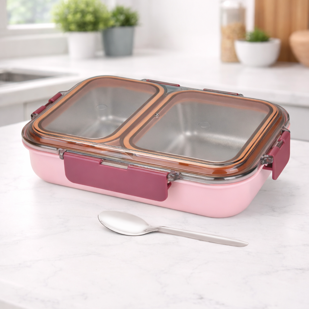 Stainless steel casserole lunch box with airtight lid and spoon on kitchen counter