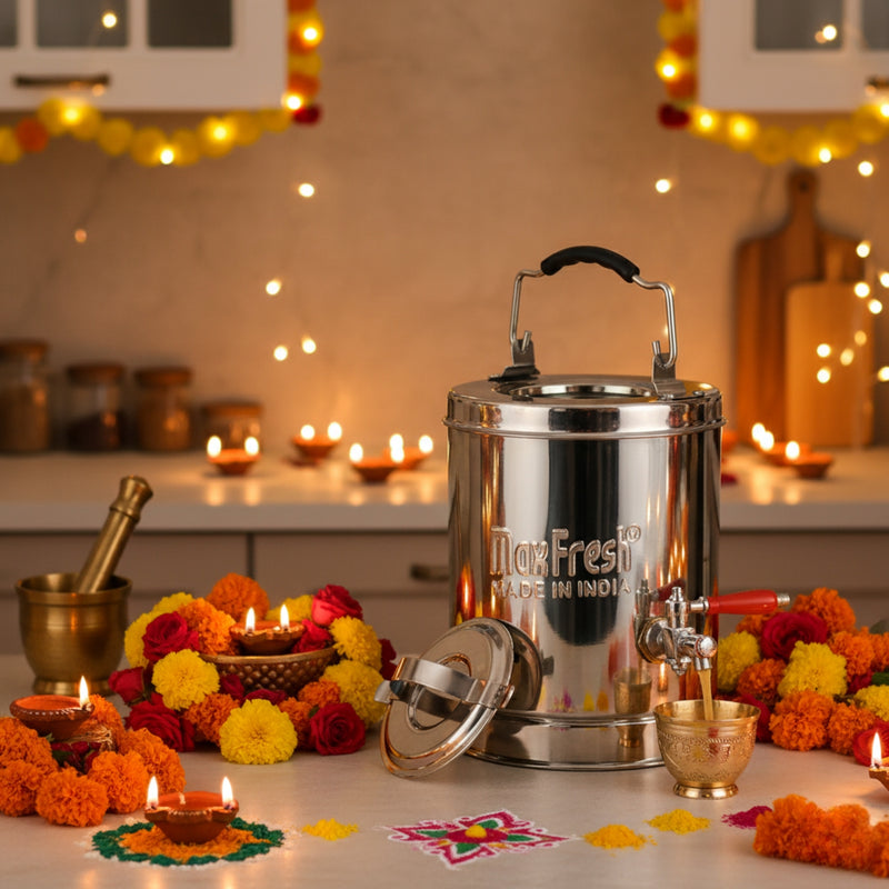 Max Fresh stainless steel container with Diwali decorations in a kitchen.